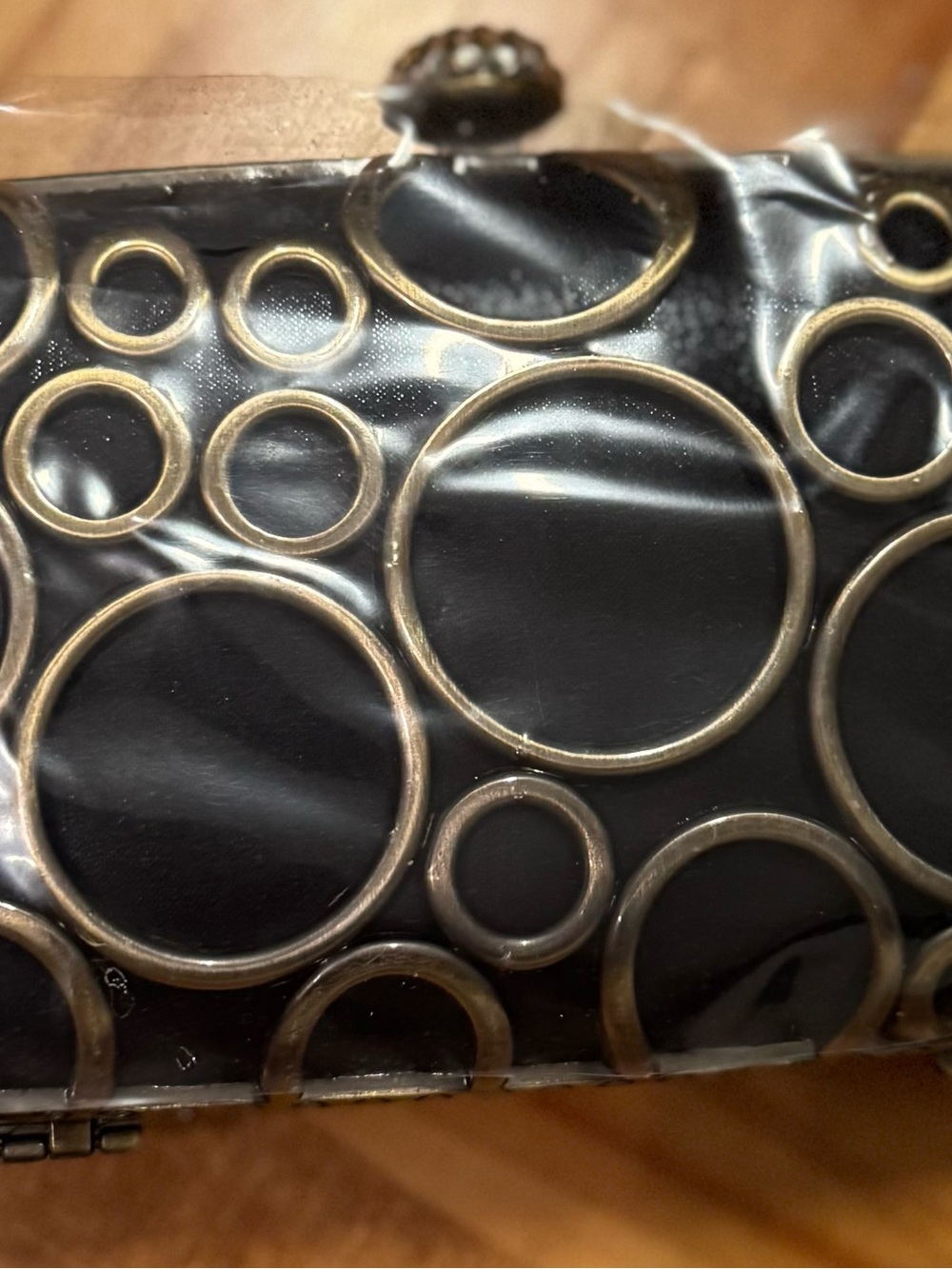 Black Mini Clutch with Gold Ring Accent